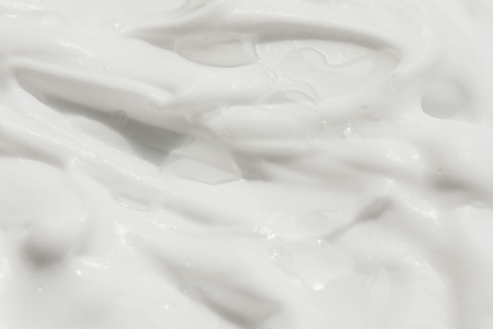 Smooth personal care texture illustrating a formulation application of Lanolin Oil.