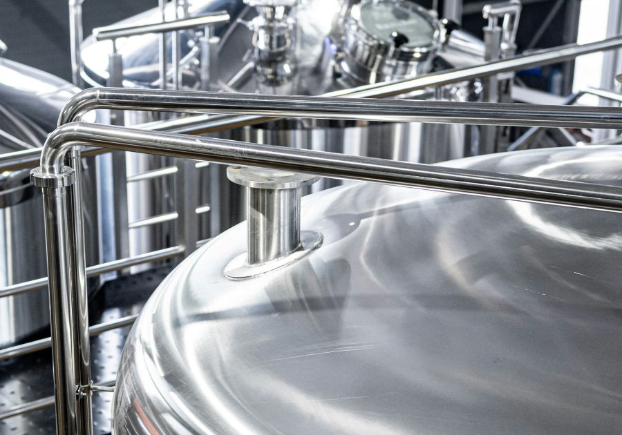 Stainless steel industrial processing equipment, illustrating the purification of refined lanolin.